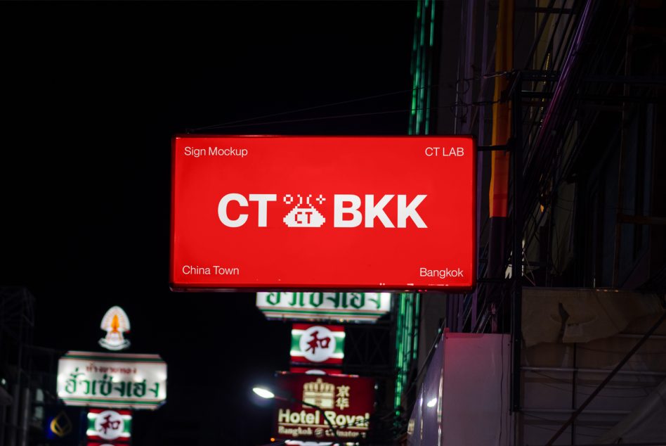 Illuminated signboard mockup displaying text CT LAB BKK in red with nighttime urban backdrop, ideal for branding graphics and font display.